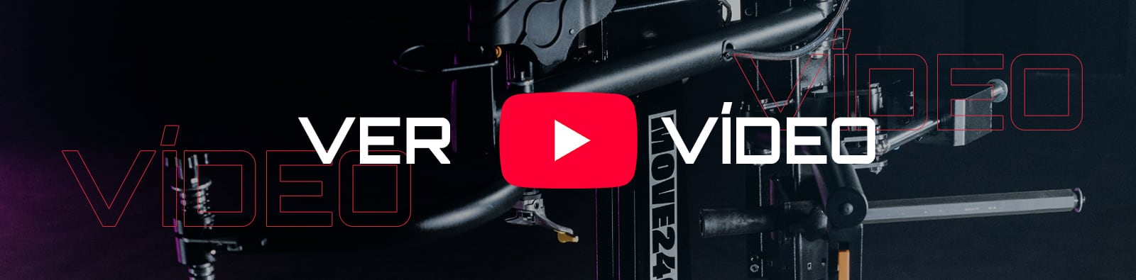 Botón rojo de reproducir de YouTube centrado entre las palabras blancas VER y VÍDEO, sobre fondo oscuro con la palabra VIDEO en contorno rojo y equipo de cámara/rig parcialmente visible