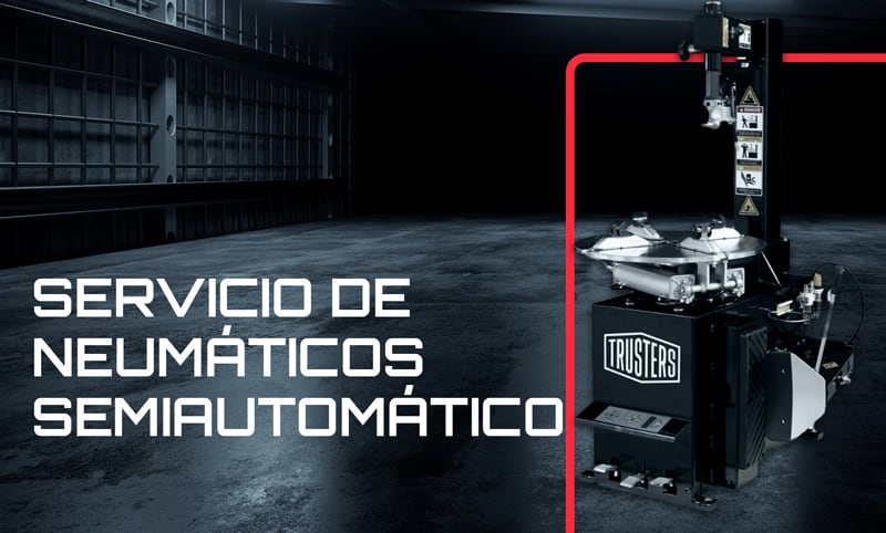 Desmontadora de neumáticos semiautomática negra a la derecha en taller oscuro, texto grande a la izquierda SERVICIO DE NEUMÁTICOS SEMIAUTOMÁTICO y línea roja vertical que enmarca la máquina.