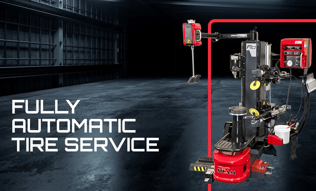Red and black fully automatic tire service machine with robotic arm, control unit and tool attachments on the right, set against an empty industrial garage interior with bold text "FULLY AUTOMATIC TIRE SERVICE" on the left