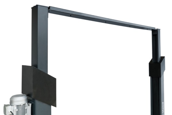 Two-post dark gray metal car lift frame with a horizontal top beam and an electric motor mounted at the lower left